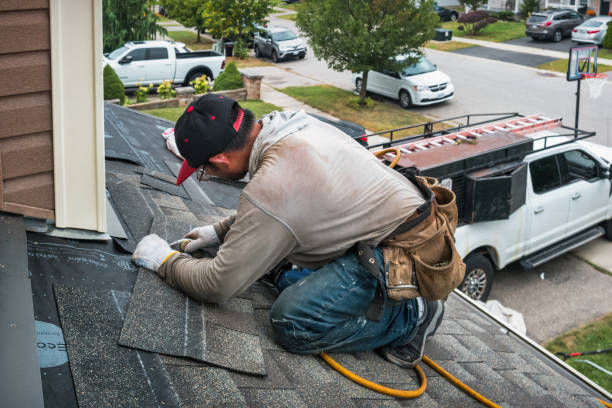 Professional Flat Roof Repair technician working in Thayer, IN